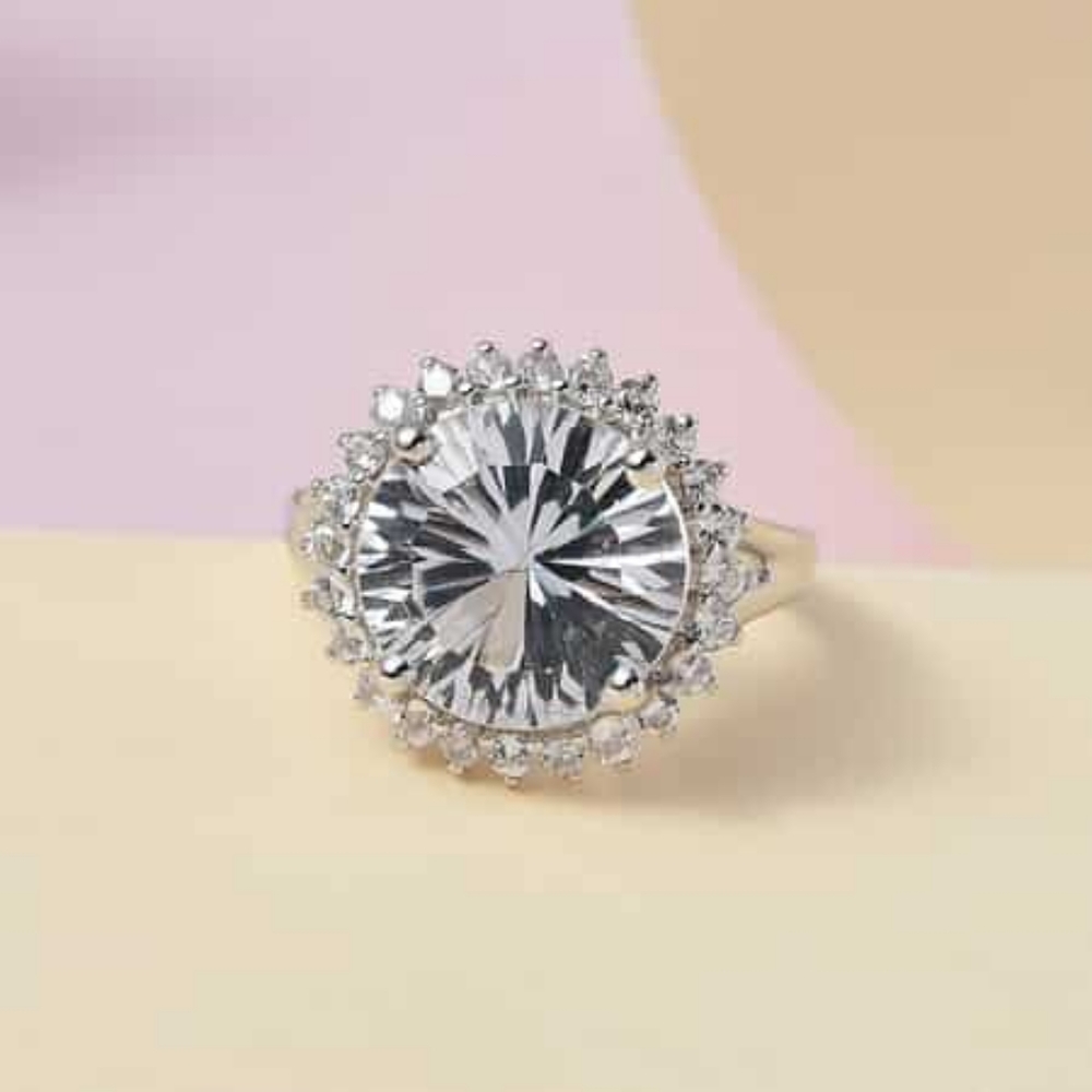 Concave cut white topaz ring